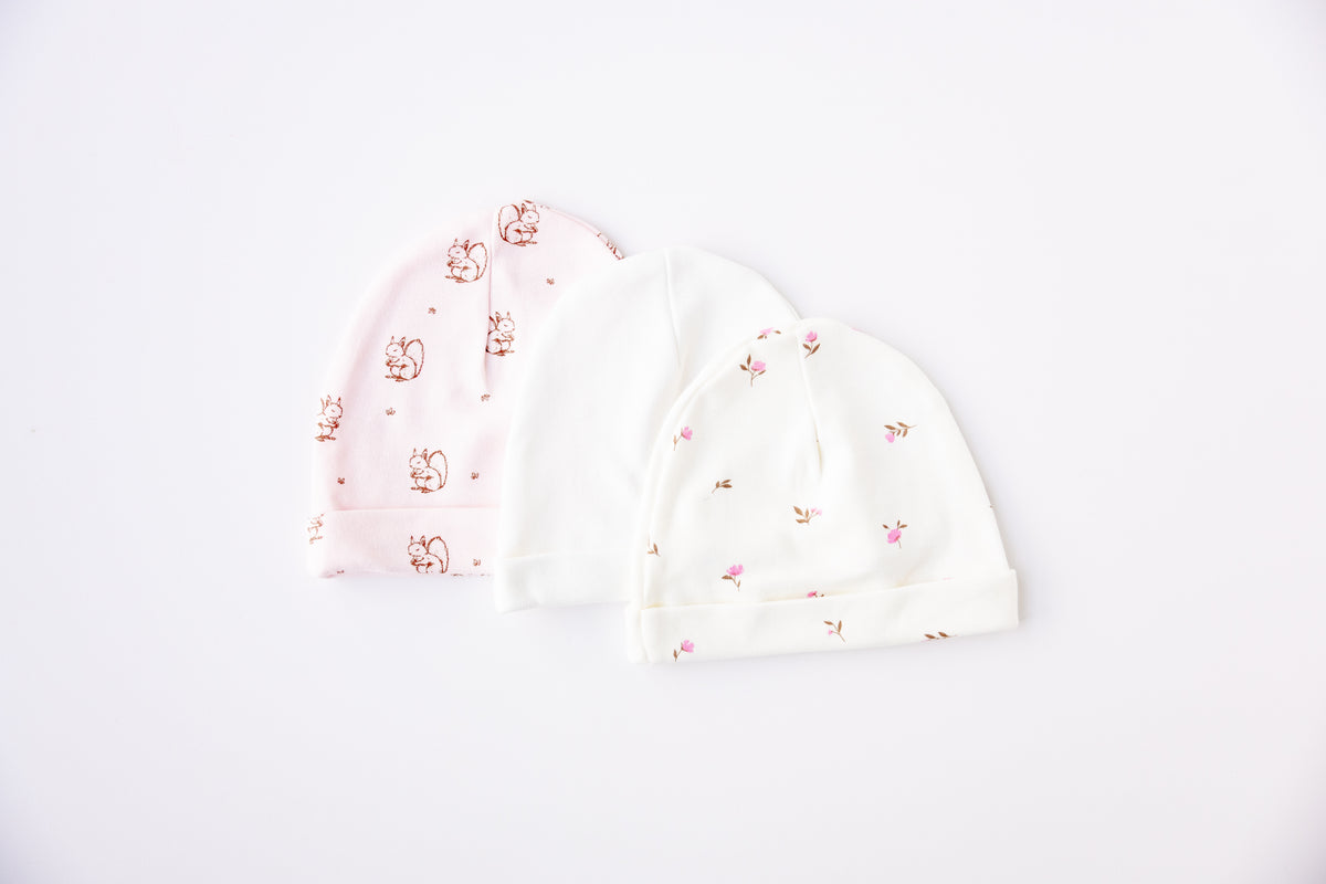 Three baby hats in white and Winter Floral print