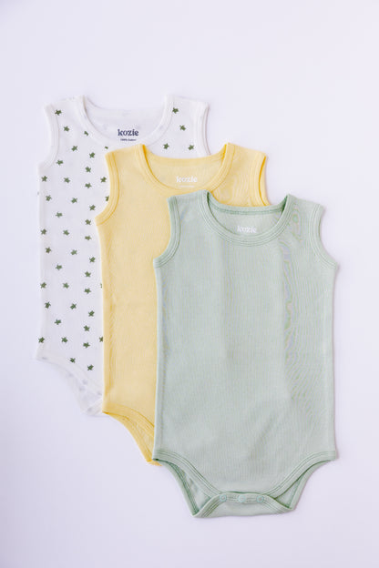 Three sleeveless bodysuits in sage, white and Turtle Bay print