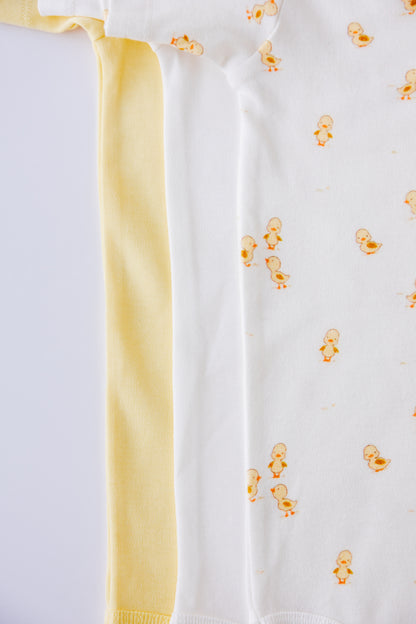Close-up of the Ducky Days duck print on a white short sleeve bodysuit