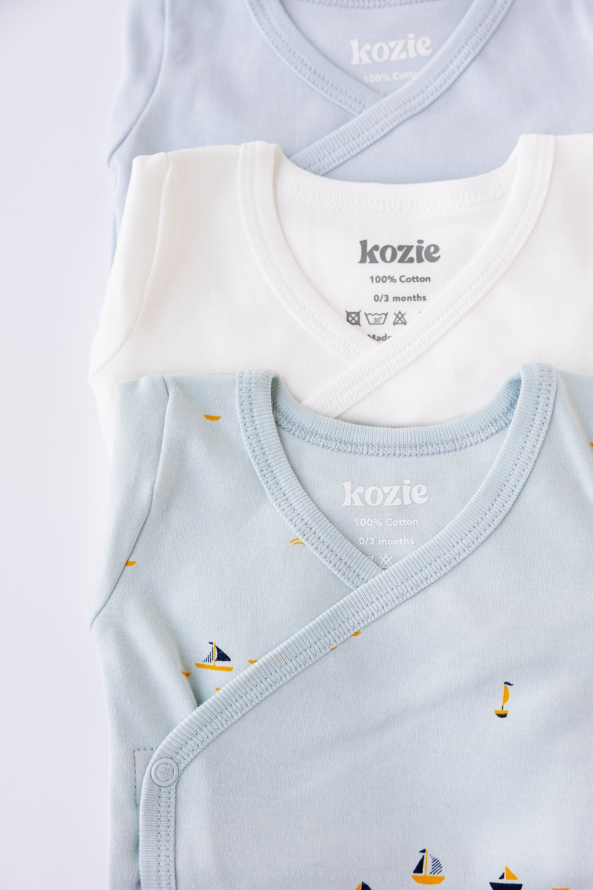 Blue Sails print kimono bodysuits folded and stacked