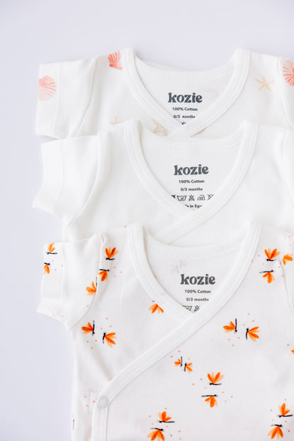 Coastal Day Dream print short sleeve kimono bodysuits, laid flat