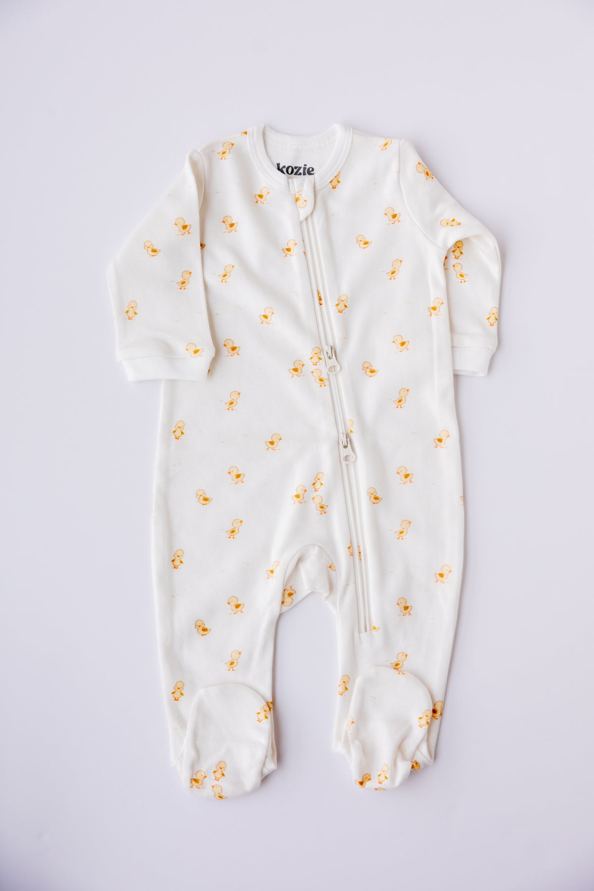 Ducky Days print zipper sleepsuit in white, laid flat