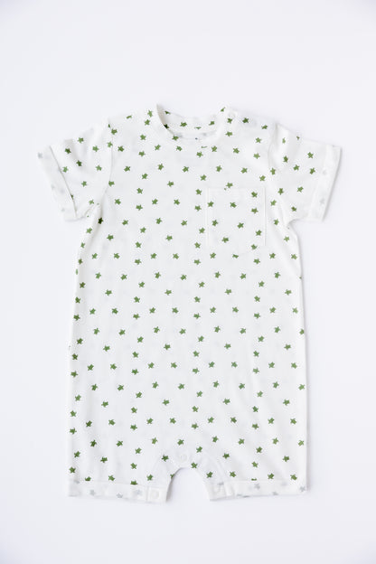 Turtle Bay print short sleeve romper in white, laid flat