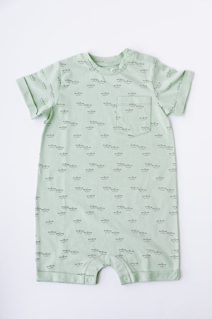 Paper Boats print short sleeve romper in sage, laid flat