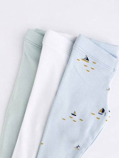 Blue Sails print leggings laid out with plain sage and white pairs